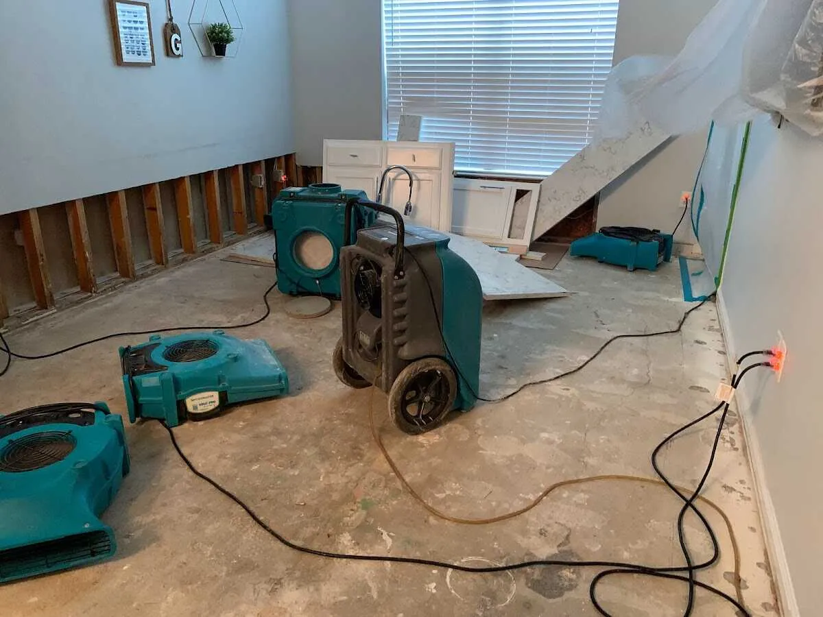 Dehumidifier in flood-cut room for Water Damage Restoration in Clarcona